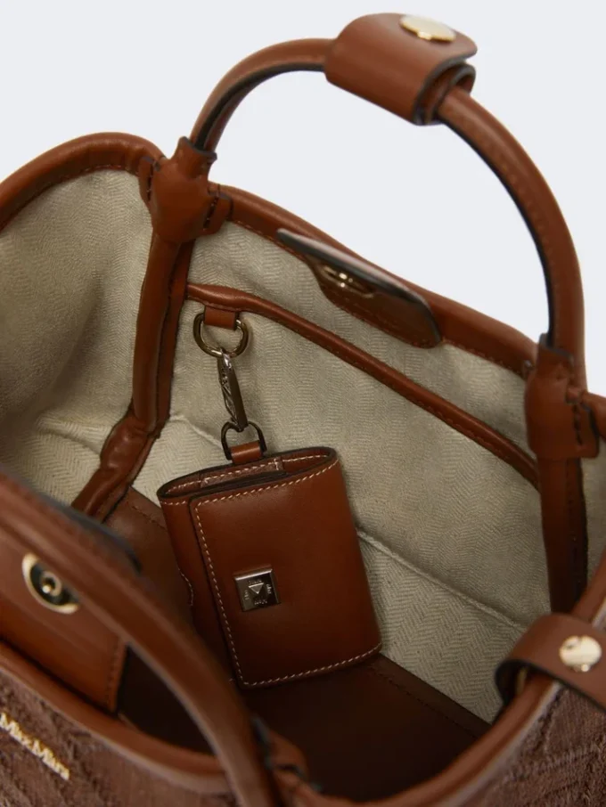 Extra-small marine bag in diamond-patterned basketweave, amber brown Extra-small marine bag in diamond-patterned basketweave, amber brown