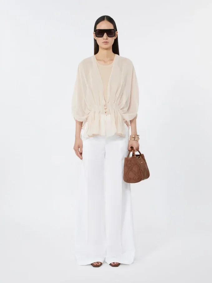 Extra-small marine bag in diamond-patterned basketweave, amber brown Extra-small marine bag in diamond-patterned basketweave, amber brown