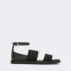 Flat sandals in leather and elasticated webbing, black