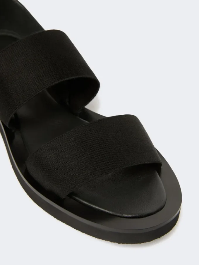 Flat sandals in leather and elasticated webbing, black