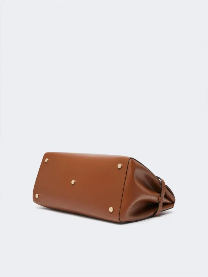 Natural leather handbag, amber brown