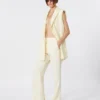 Slim-fit flared trousers in viscose, ivory Slim-fit flared trousers in viscose, ivory