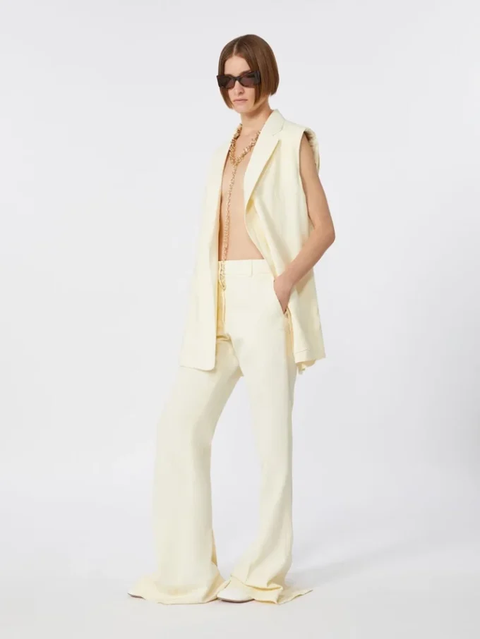 Slim-fit flared trousers in viscose, ivory Slim-fit flared trousers in viscose, ivory