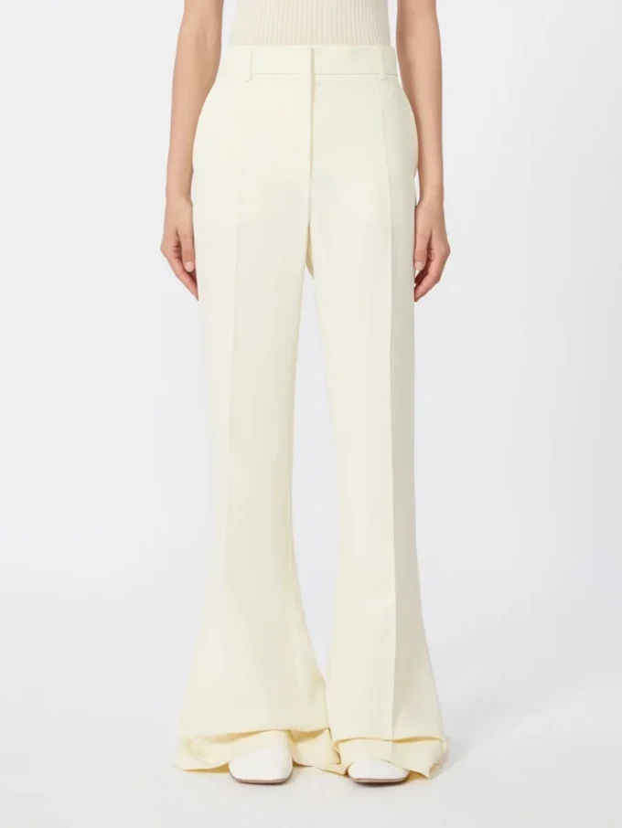 Slim-fit flared trousers in viscose, ivory Slim-fit flared trousers in viscose, ivory