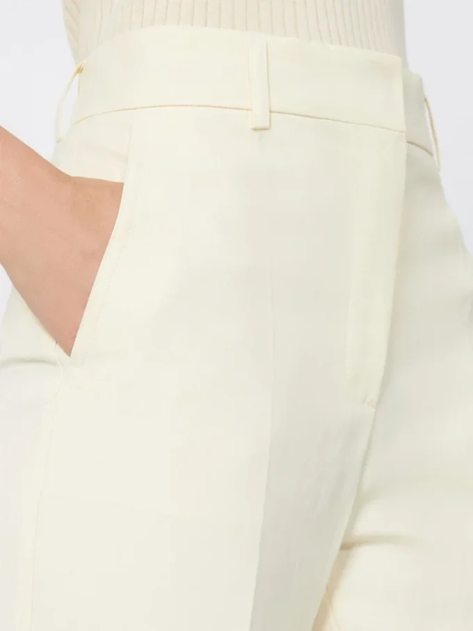 Slim-fit flared trousers in viscose, ivory Slim-fit flared trousers in viscose, ivory