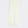 Slim-fit flared trousers in viscose, ivory Slim-fit flared trousers in viscose, ivory