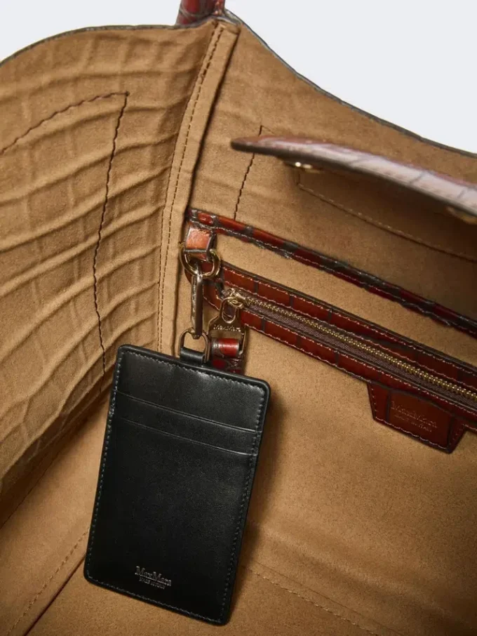 Small crocodile-print leather marine bag, brown