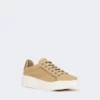 Suede sneakers, sand